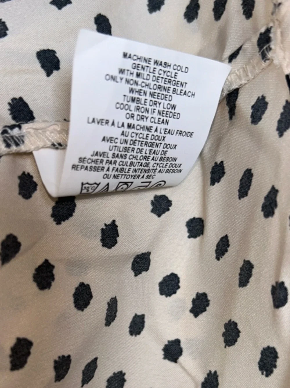 Motherhood Maternity Cream Dress with Black Polka Dots and Ruffle V-Neck - Picture 8 of 9